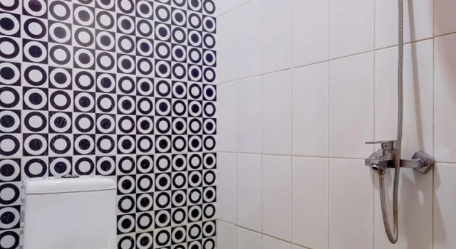 Deluxe Twin room OYO Flagship Tembok Batu Residence