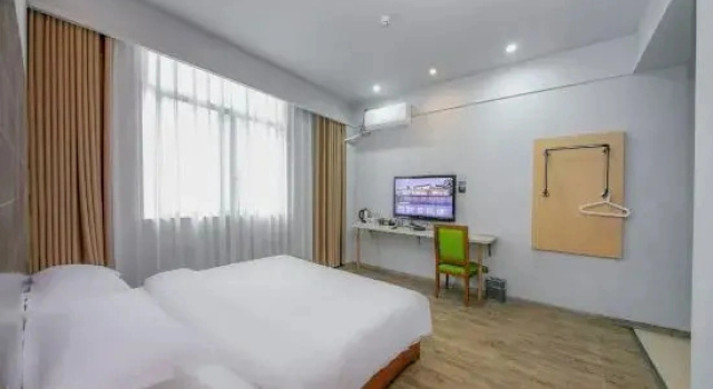 Люкс Lequ Zhixuan Hotel (Guanghan Night Market North Railway Station)