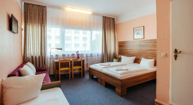 Четырёхместный номер Standard Alper Hotel am Potsdamer Platz