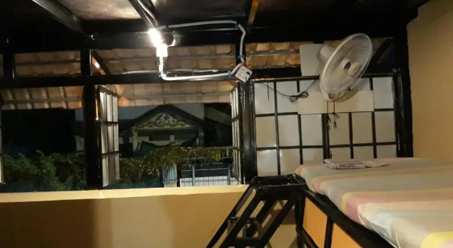 Кровать в общем номере Vannys Peaceful Guesthouse