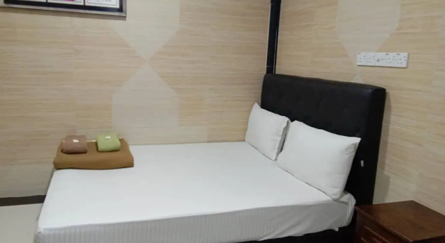 Кровать в общем номере Hartamas Business Hotel