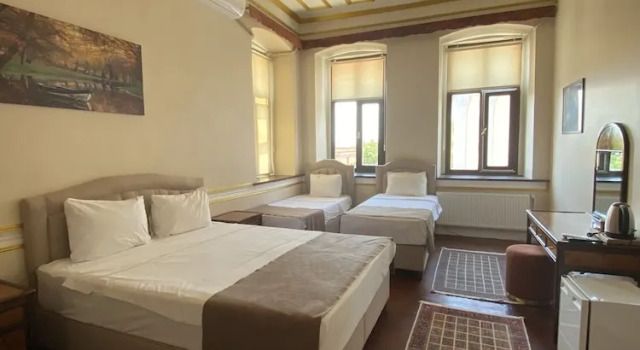 Standardowy czteroosobowy rodzinny pokój Oasis Pansiyon Hotel