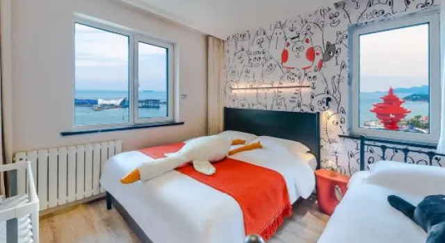 Трёхместный семейный люкс с 2 комнатами с балконом и с видом на море Miomi Homestay