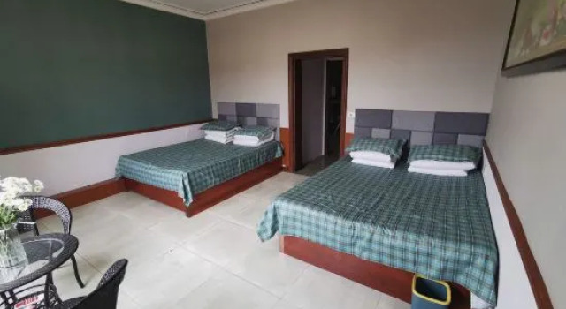 Кровать в общем номере c 1 комнатой Yikang Farm House