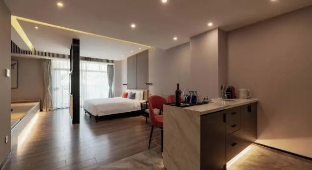 Standardowy dwuosobowy rodzinny pokój Lujiang Mega Hotel