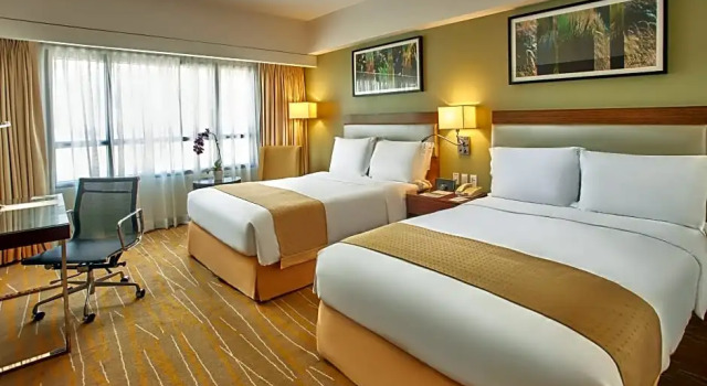 Номер Executive Bright Makati Glass View By GreenBelt