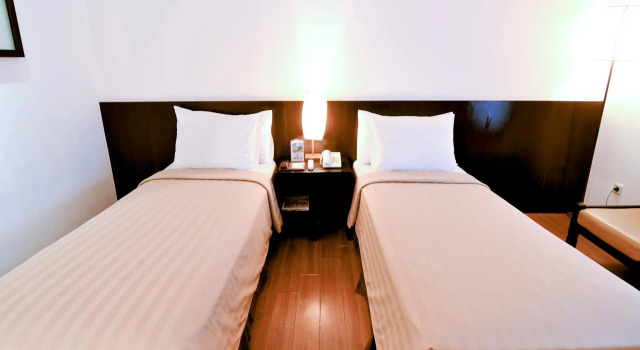 Двухместный номер Deluxe Gumilang Regency Hotel By Gumilang Hospitality