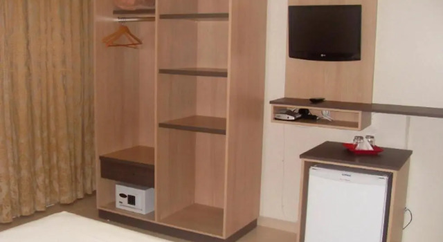 Четырёхместный номер Standard Hotel Rosa da Ilha Guaruja - 80m do mar, 02 piscinas, sala de jogos, brinquedão de percurso para crianças