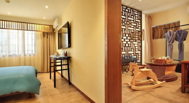 Четырёхместный семейный номер Standard с видом на внутренний двор The Beyond Villa Guilin Boutique Hotel