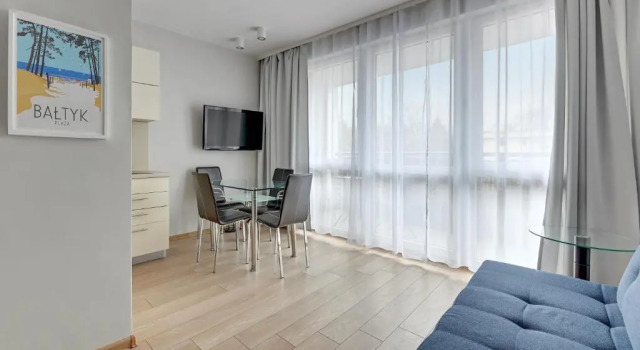 Апартаменты Sunrise apartments close to the beach & by Noclegi Renters