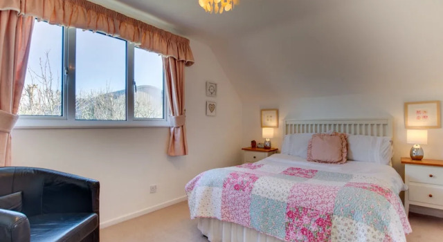 Detached Holiday Home With a Colourful Garden, Stove and Cosy Furnishings