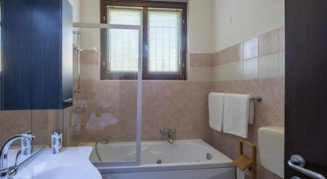 Апартаменты Appartamento in villa con giardino a 300m dal Lago Maggiore