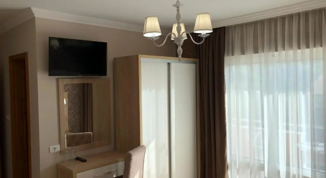 Номер Deluxe "HOLIDAY" apartments & rooms