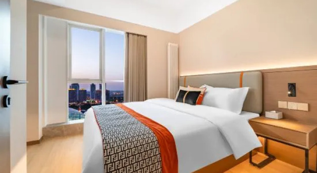 Люкс Mingren Hotel (Zhengzhou East High-speed Railway Station)