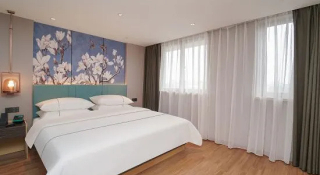 Двухместный люкс Magnotel Hotel (Shanghai Pudong Airport Core Area International Tourism Resort)