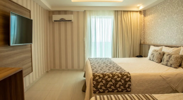 Номер Deluxe рядом с пляжем Paradiso Macaé Hotel