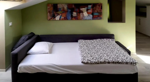 Апартаменты Мансарда с видом на озеро Garda Bloom Holiday Apartments