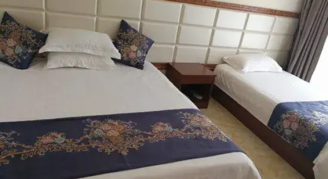 Кровать в общем номере Volga River Business Hotel