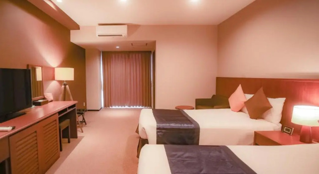 Двухместный номер Deluxe Japanese-Style with Bathroom The Yuinchi Hotel Nanjo
