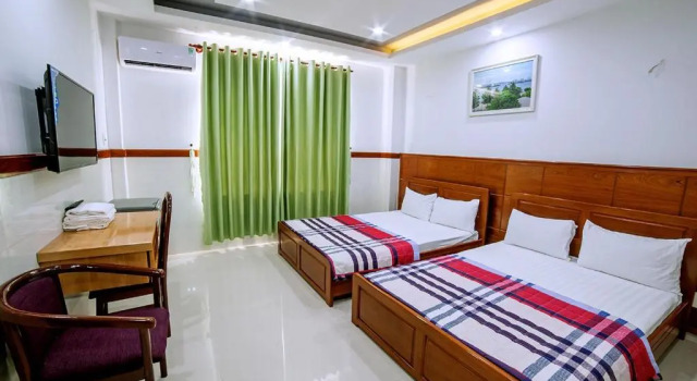 Номер Standard Khách Sạn Quốc Cường-Dì Tám