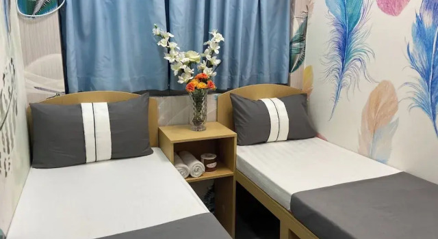 Кровать в общем номере Rhine Guest House
