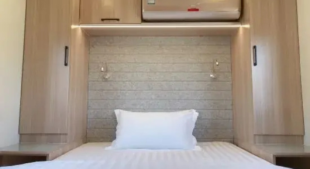 Кровать в общем номере Songlan Mountain Lanyu RV Camp