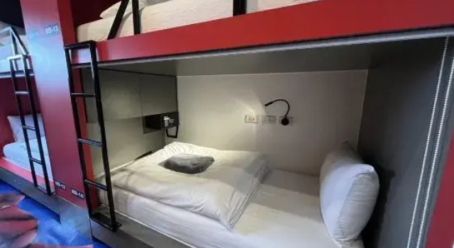 Кровать в общем номере Stardust Boutique Hotel
