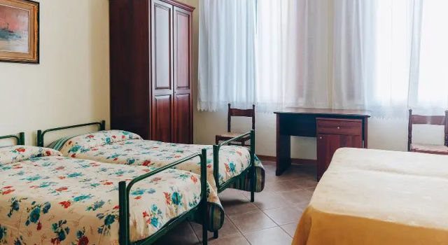 Четырёхместный номер Classic Hotel Savoia e Campana