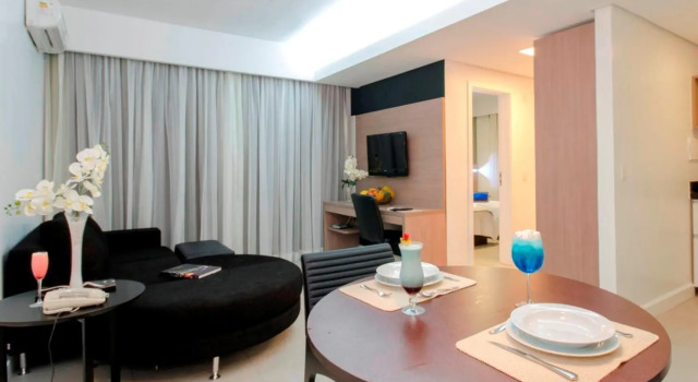 Кровать в общем номере Hotel Adrianópolis All Suites