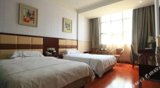 Кровать в общем номере Wanhao Business Hotel