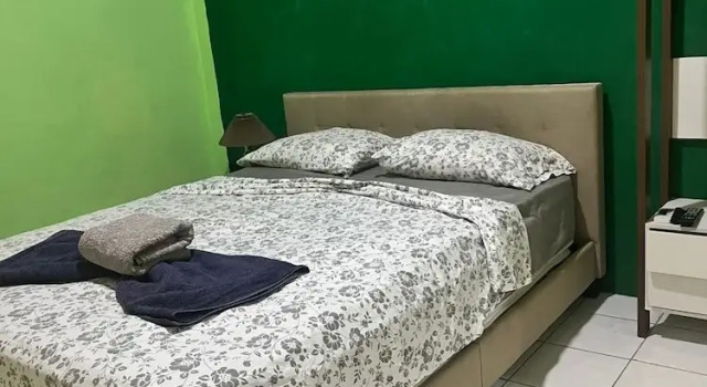 Confort chambre Emerlad Aparments
