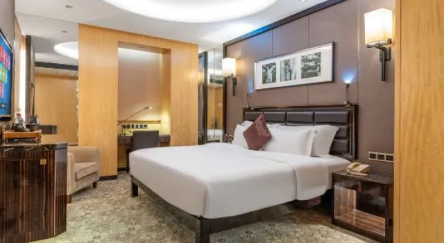 Номер Deluxe Zhongshan Tegao Business Hotel