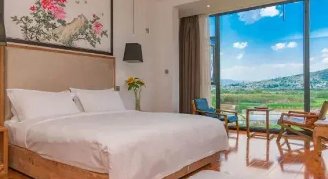 Кровать в общем номере Zhuxiyuan Resort Inn