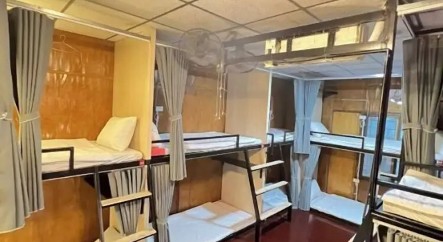 Кровать в общем номере Heritage Corner Hostel