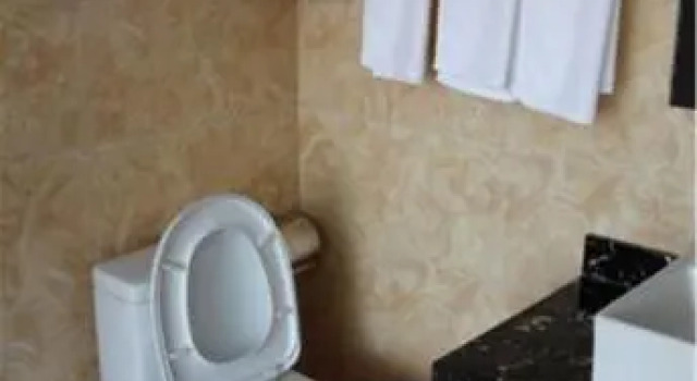 Qingdao Qianqingju Business Guesthouse, Prenota Hotel Hotel a Shandong con parcheggio, Parcheggio