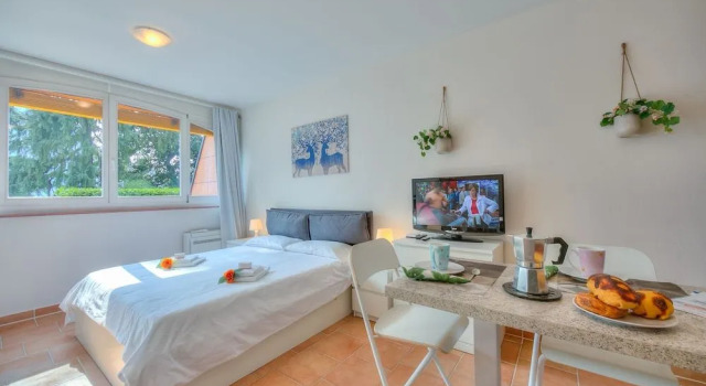 Gelsomino Apt. 5 Front Lake, Забронировать Отель Отели Лугано с парковкой, Парковка