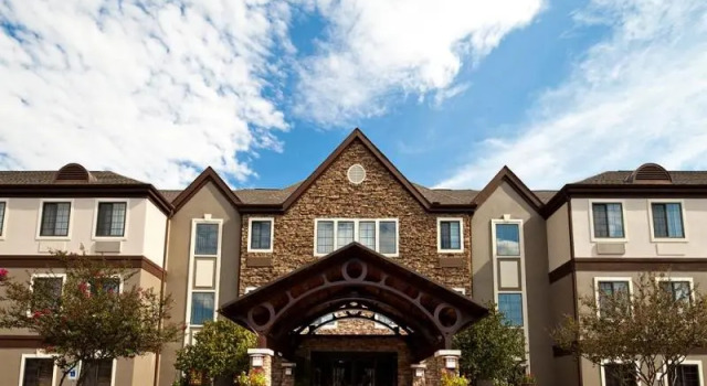 Кровать в общем номере Staybridge Suites DALLAS-LAS COLINAS AREA