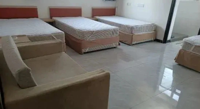Кровать в общем номере с балконом Fuju Hotel, South Fujian
