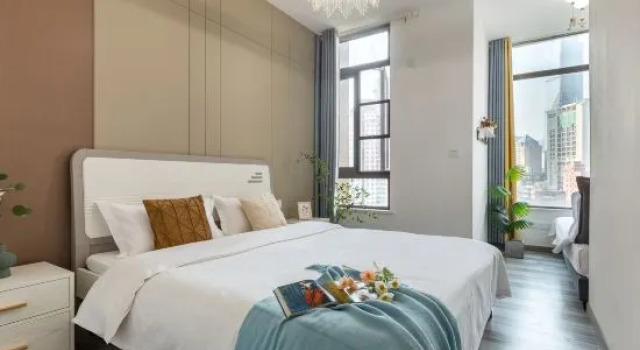Семейный люкс с 4 комнатами Friendly Nanyuan Riverview Homestay (Jiefangbei Hongyadong Location)
