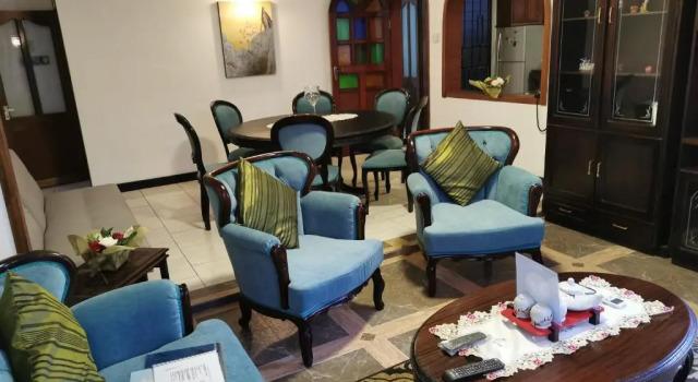 Апартаменты R&G Justlikehome Apartment 1 with blue sofa set and Apartment 2 with Garden View with brown sofa set