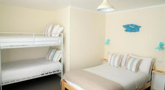 Standaard Familie kamer met balkon Beach House