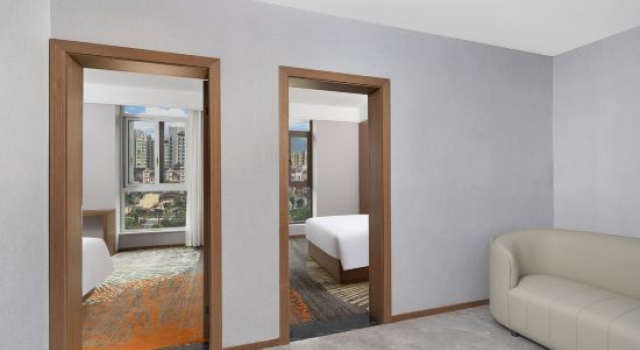 Семейный люкс Xichang Guantang Hotel (Qionghai 17 Degrees Tang Garden Branch)