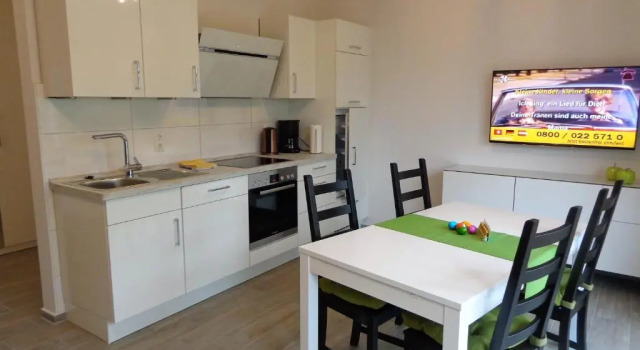Апартаменты Ostfrieslands Perle Ferienwohnung an der Nordseeküste, Sauna, Terrasse, Garten, ruhige Lage, WLAN