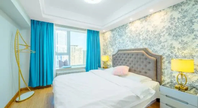Семейный люкс с 2 комнатами NO.8 Qing Ni Apartment(DL Railway Station Zhongshan Square Branch )