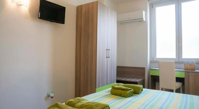 Четырёхместный номер Standard с видом на сад B&B La Rosa Dei Venti