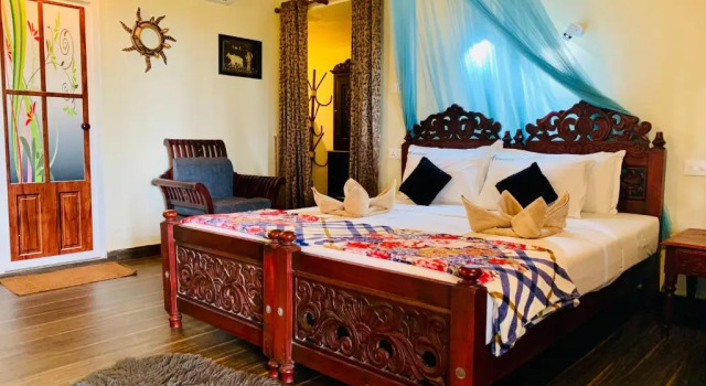 Коттедж Deluxe с балконом и с красивым видом из окна Maadathil Cottages & Beach Resort