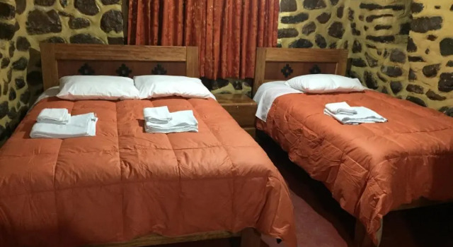Четырёхместный семейный номер Standard Rumi Sonqo Hostel