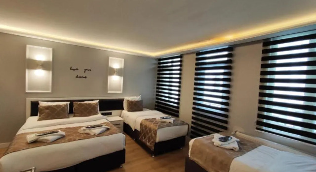 Standardní Čtyřlůžkový pokoj s balkonem Luce Suite Hotel