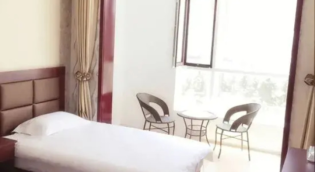 Семейный люкс с 4 комнатами Xining Shengxing Family Hotel