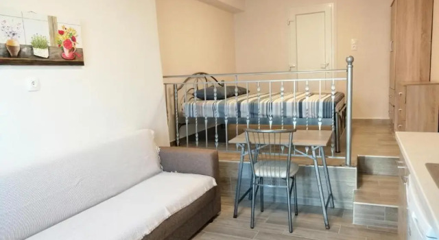 Marina's Apartments - White & Stone Apartment